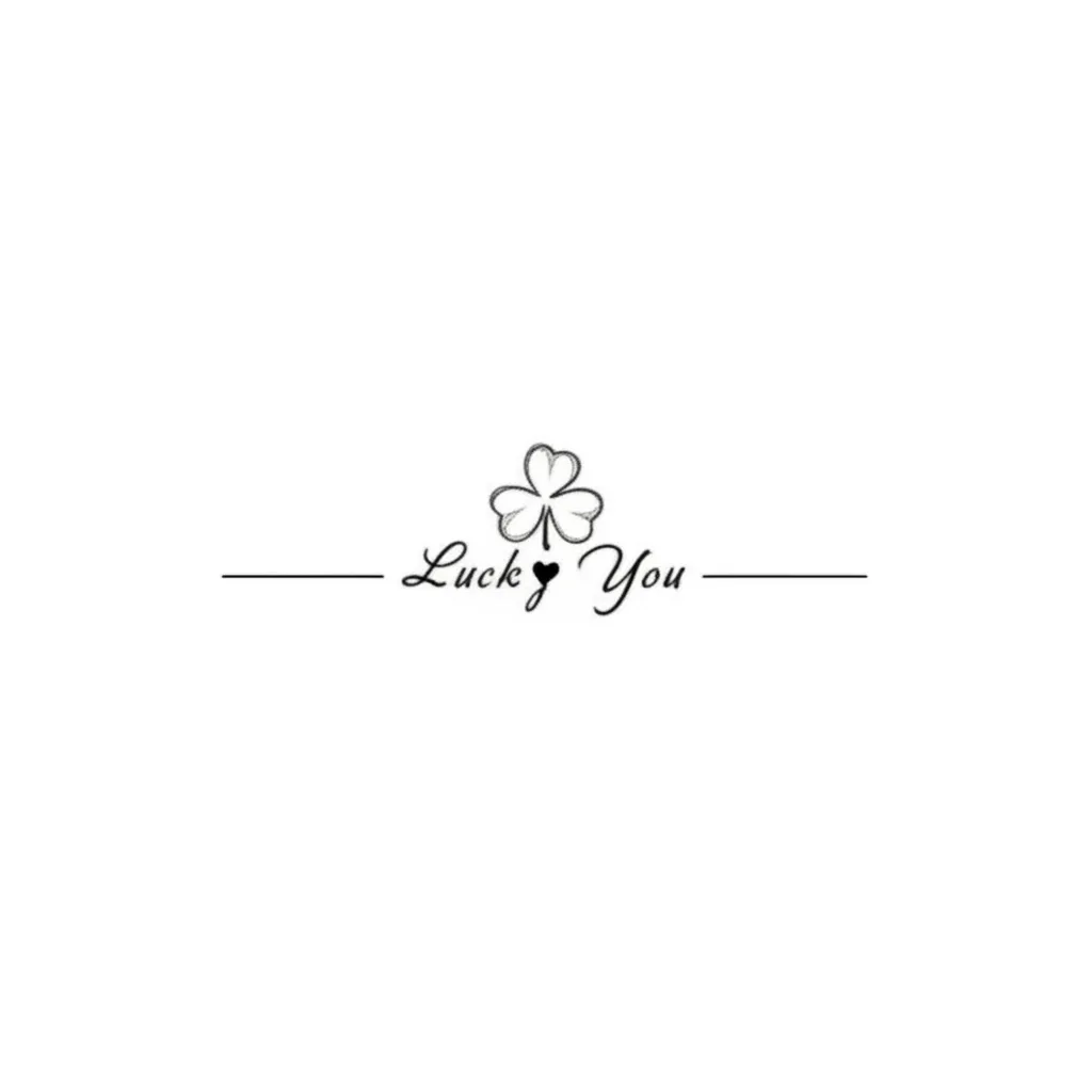 Lucky You Spine Tattoo: Minimalist Clover & Heart Design